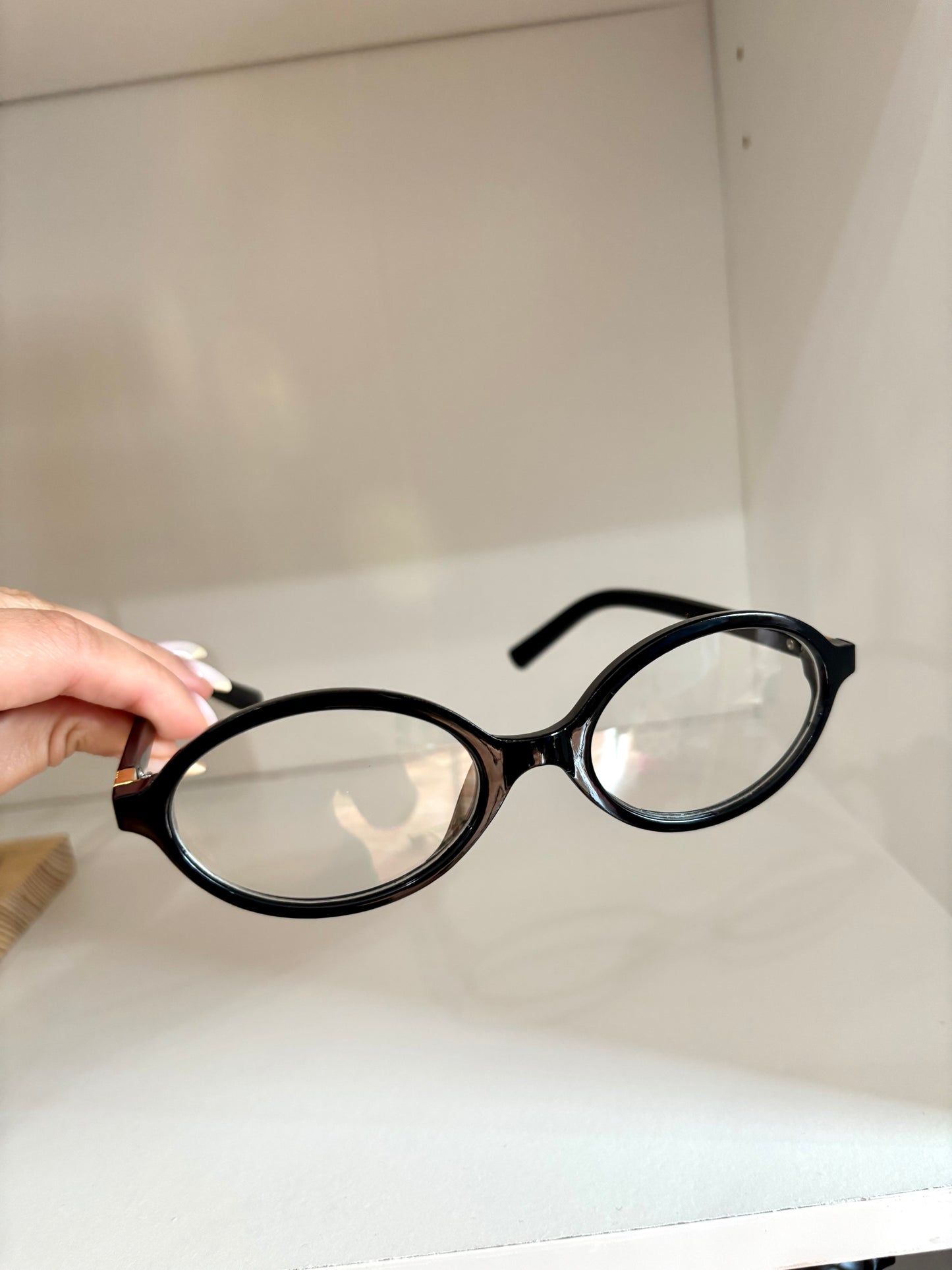 “Black Oval Glasses”